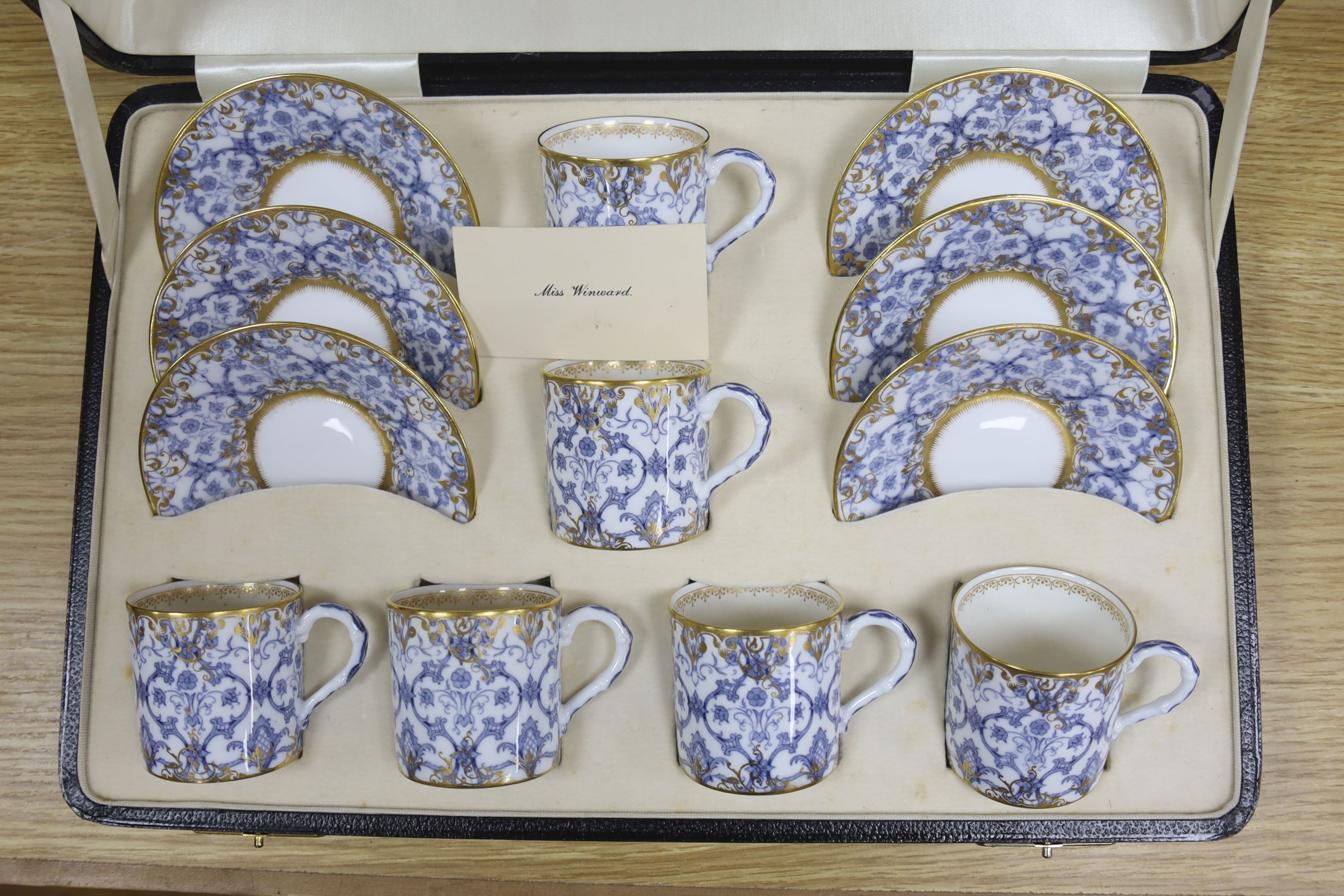 A cased Royal Worcester blue and gilt coffee for 6